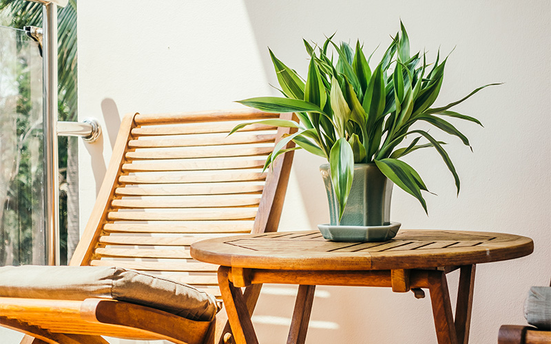 Sustainable wooden patio furniture showcasing high-quality, long-lasting craftsmanship.